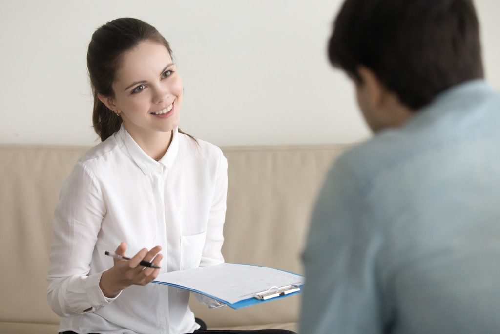 insurance agent explaining to a client
