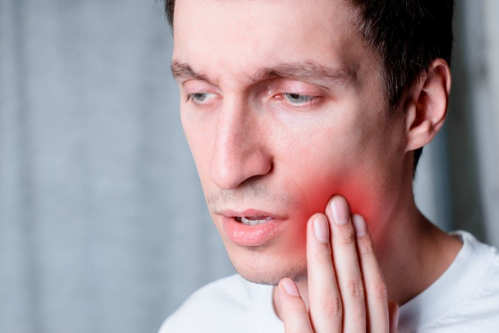 Man experiencing toothache