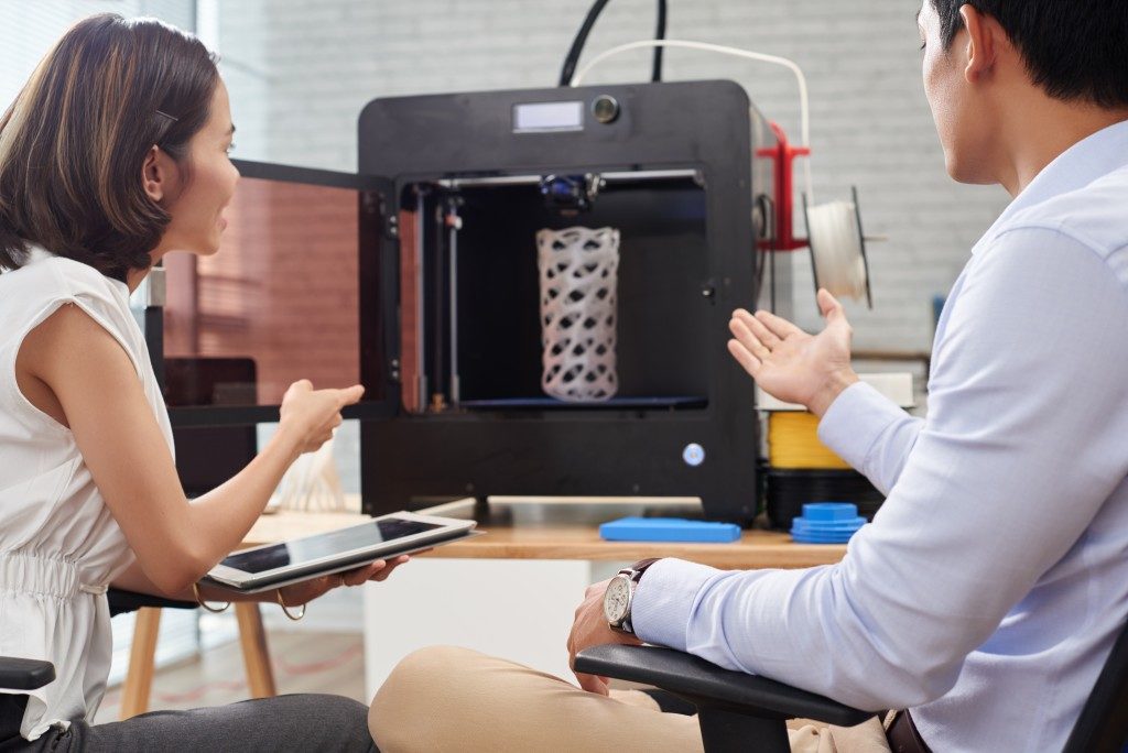 man and woman testing a prototype