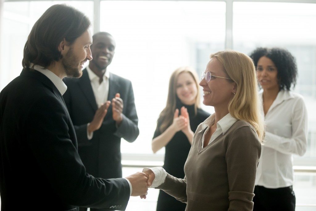 congratulating employee