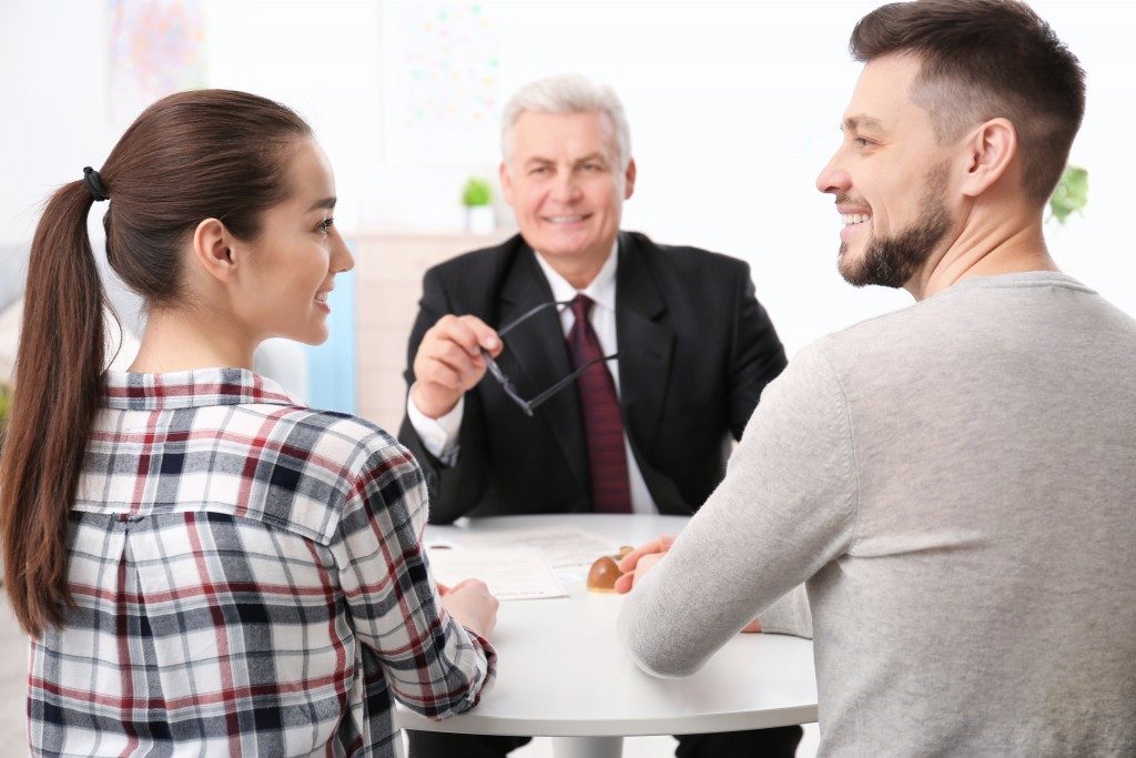 real estate agent and clients