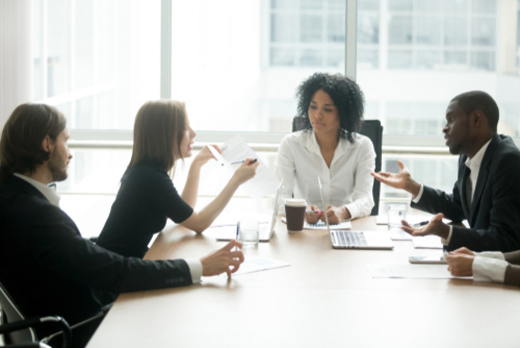 two sides of business owners fighting in a meeting