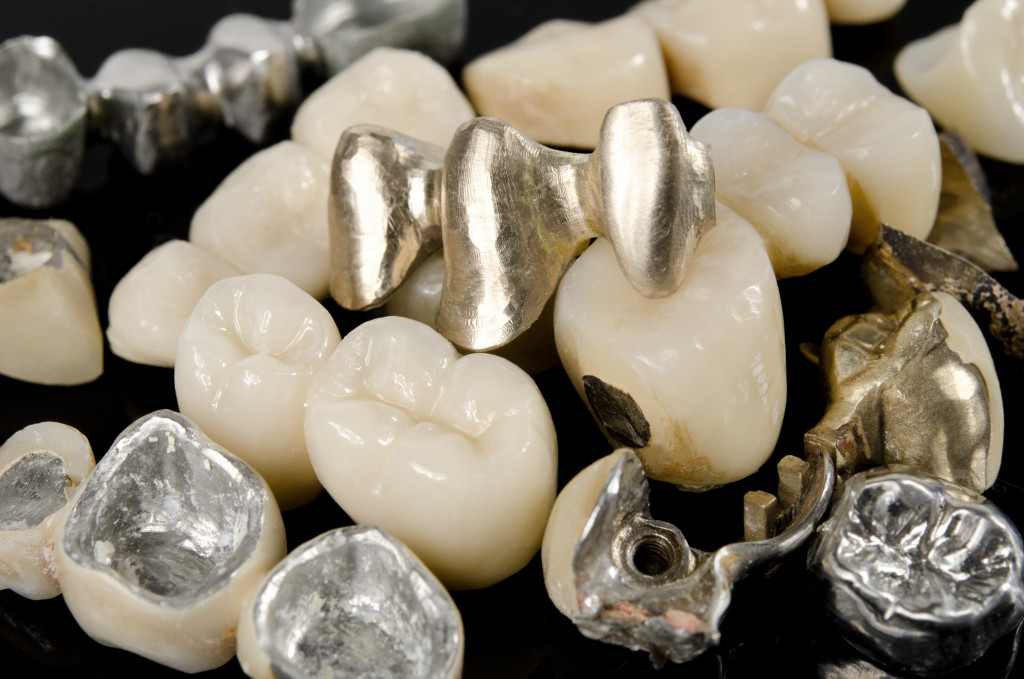 assorted dental bridges and crowns closeup photo
