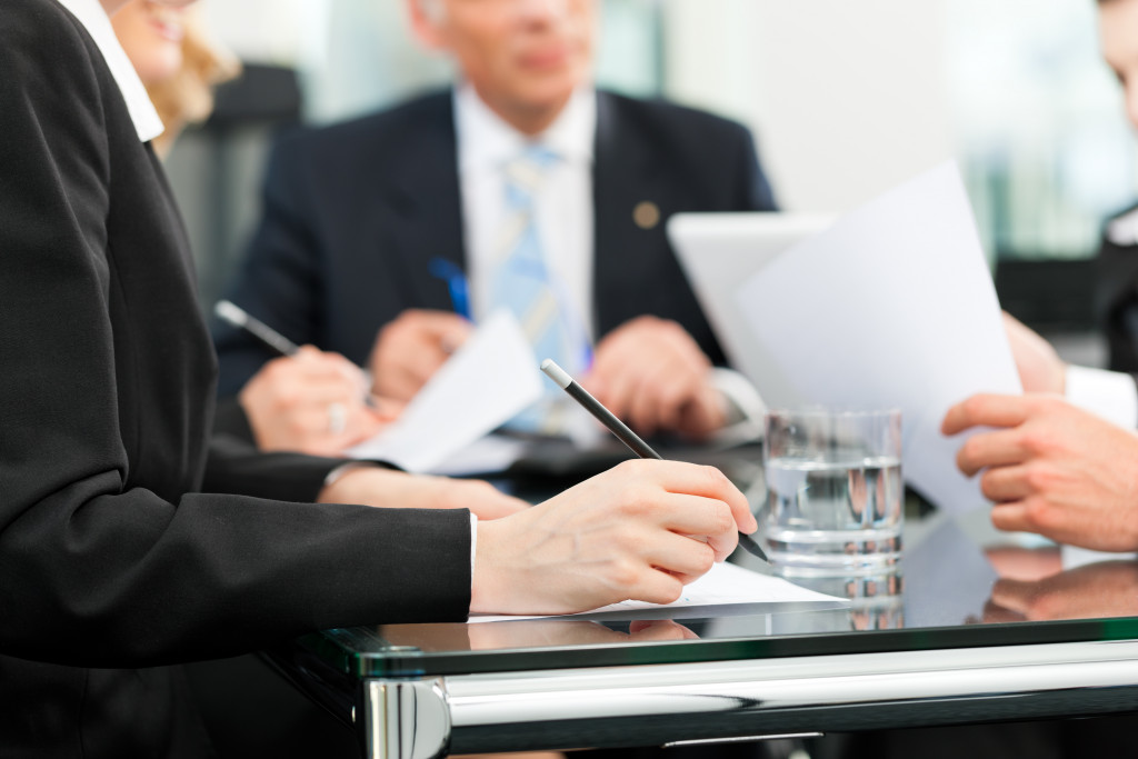 a group of businessman in a meeting