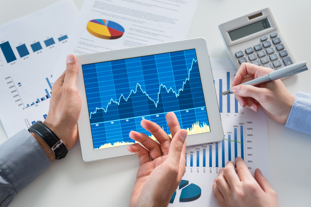 business people discussing financial data and projections