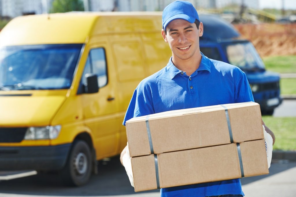 delivery man holding packages