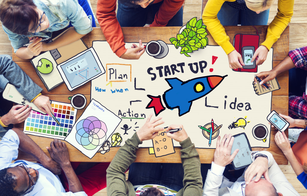 startup team in an informal meeting with other young entrepreneurs